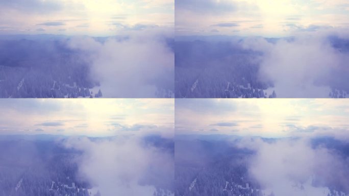 雪山景观透过云层在海拔2000米