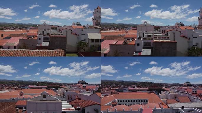 航空摄影机从玻利维亚苏克雷的屋顶窗户飞出去