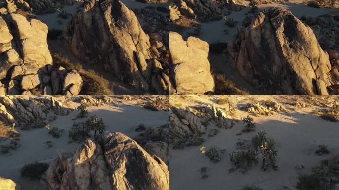 无人机飞过沙漠中的巨石