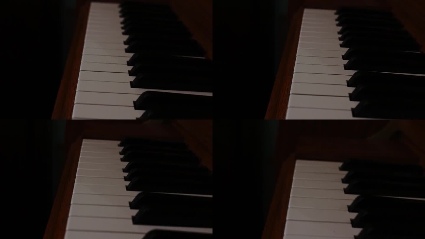 镜头在钢琴键盘上移动