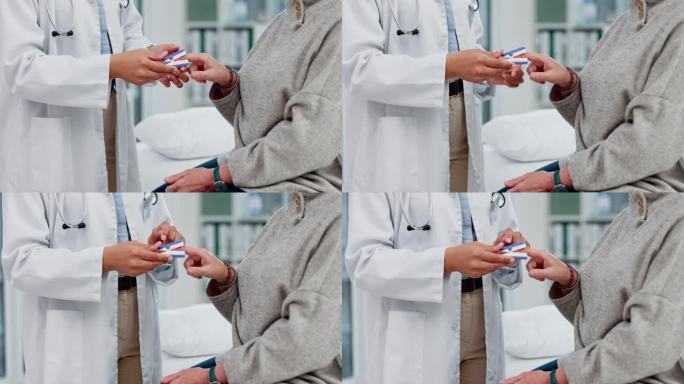 保健方面，医生双手拿着病人和血氧仪在会诊，检查血液中的氧含量。医院，帮助和一个医疗工作者带着装备和一