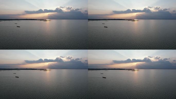 无人机拍摄的日落前帕瑶湖划船的鸟瞰图