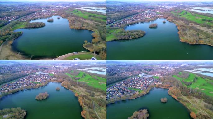 4K空中无人机镜头飞行整个长度的曼弗斯湖滨水区船俱乐部，迪尔恩谷信托，迪尔恩湖，罗瑟勒姆，南约克郡，