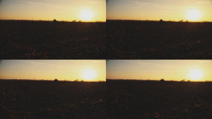 日落时分，犁过的田野映衬天空的宁静景象