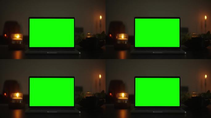 身临其境的素材:用绿色屏幕笔记本电脑和节日烛光变换您的视频