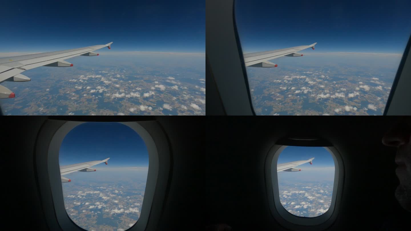 特写:飞机上的旅客在飞行过程中拉下了飞机窗户上的百叶窗