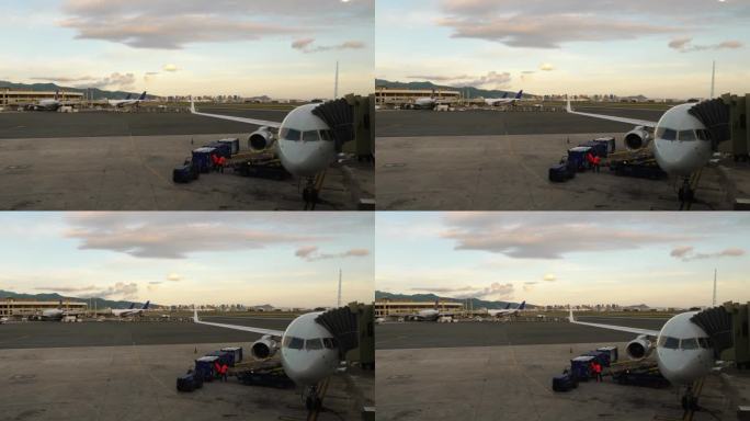 日落时分，飞机在机场滑行，檀香山的城市天际线，4k慢动作，60fps