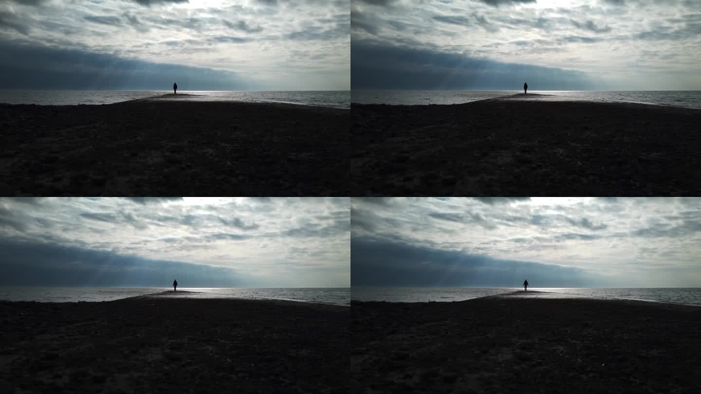 远处一个人在湖边做开合跳的广角镜头