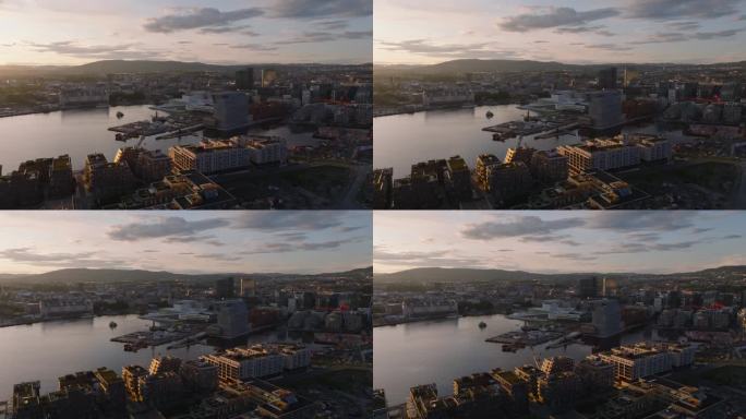日落时分贝在城市的航拍幻灯片和全景镜头。挪威歌剧院和芭蕾舞团在海滨的未来主义建筑。首都的现代建筑。挪