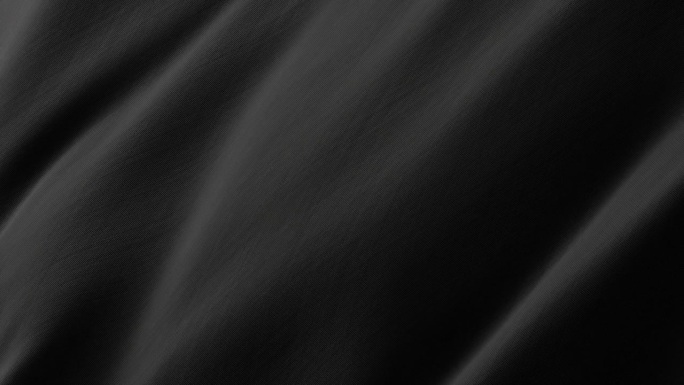 特写波浪黑色丝绸面料飘动的表面与织物细节