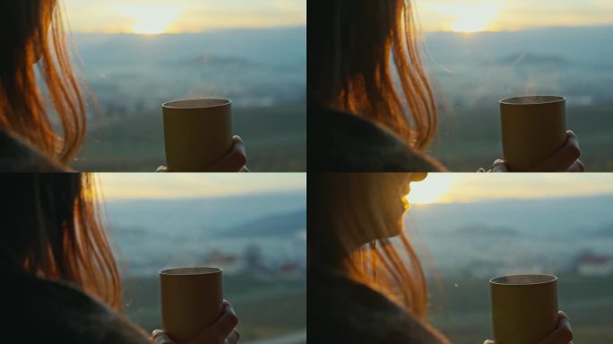 年轻女子手捧一杯热咖啡，享受窗外日落美景的特写后视图