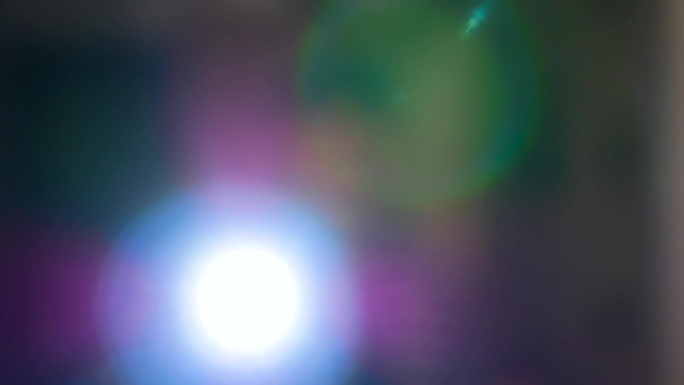 纹理光线电影院，绿色电影眩光，闪光灯闪耀，闪光灯在相机镜头，美丽的散景圈，背景文字复制空间。