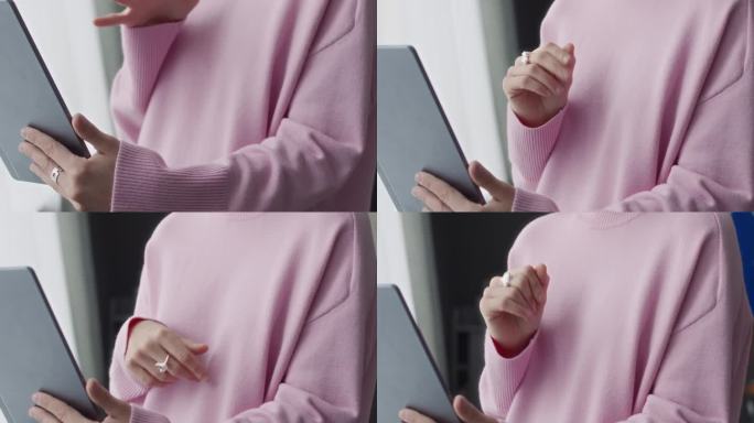 女孩在平板电脑上视频聊天时说手语