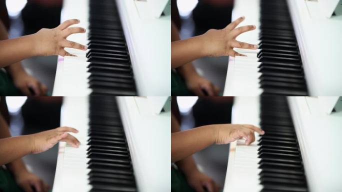 孩子在学弹钢琴