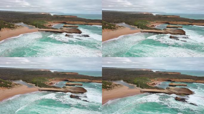 澳大利亚大洋路:鸟瞰著名的海滨公路、海浪、沙湾和雷洞附近的海滨小径