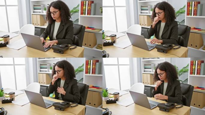 感染流感，年轻漂亮的西班牙女员工在办公室用笔记本电脑工作时咳嗽