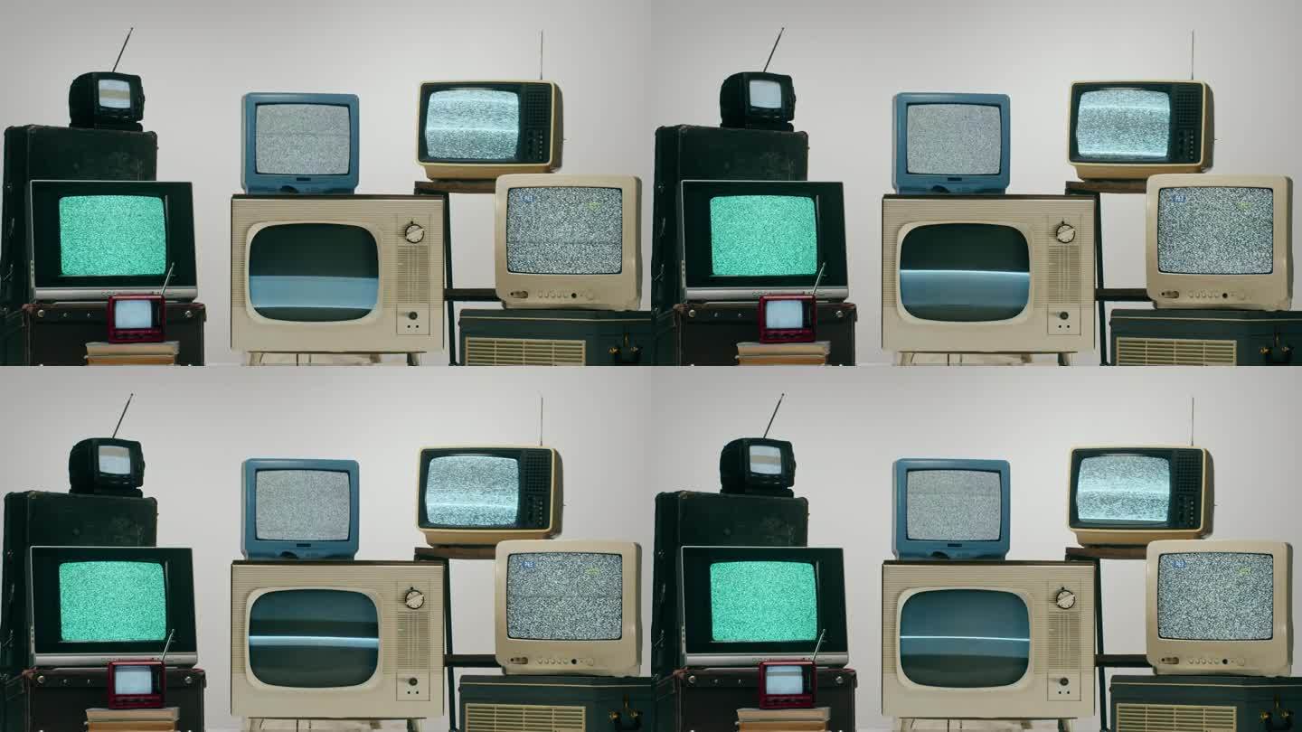 浅色背景上有灰色干扰屏的旧电视。复古电视构图，怀旧。灰色噪音屏幕和故障。