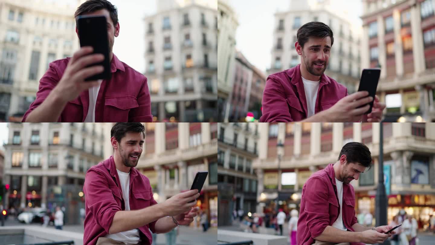 在经典的城市建筑前玩手机和社交媒体的快乐男人。