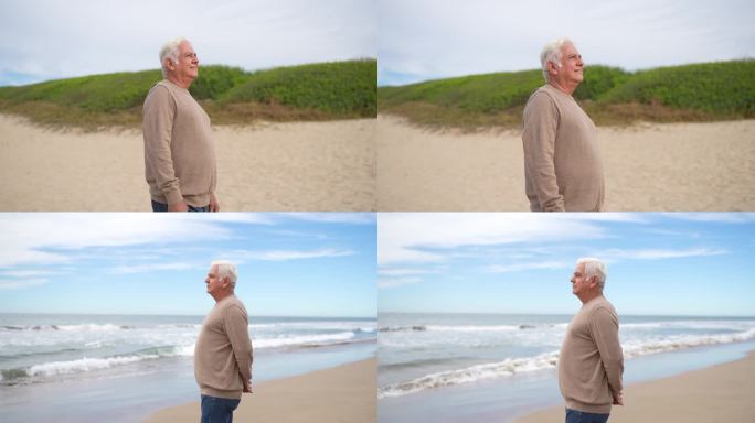 老人望着别处，凝视着海滩