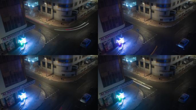 夜间照明迪拜城市交通街道十字路口屋顶全景4k延时阿联酋