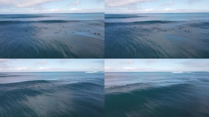 海浪 海水 人 冲浪在碧蓝的海洋上