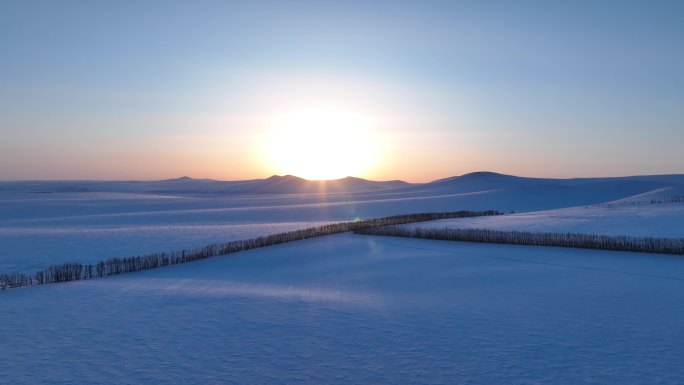 航拍寒冬呼伦贝尔草原暮雪