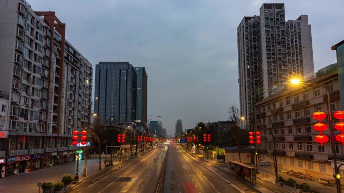 城市天亮延时城市路灯熄灭城市夜转日延时