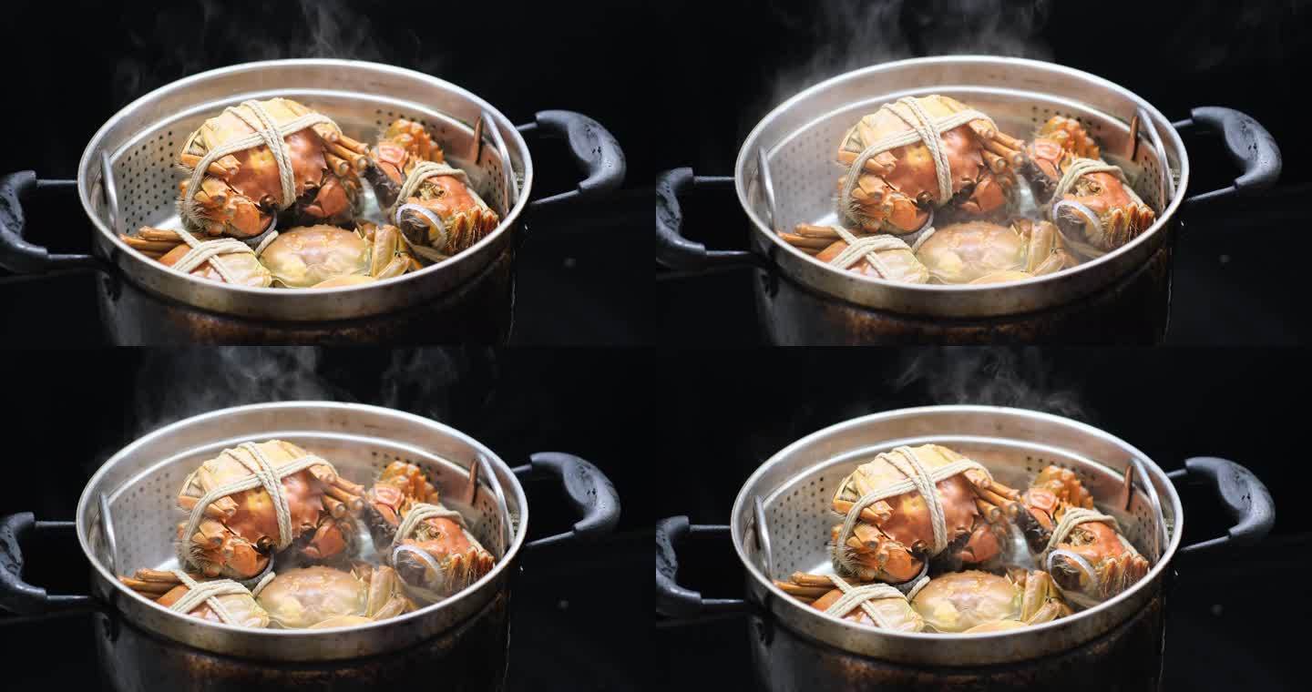 蒸螃蟹的特写，螃蟹在锅里，热气腾腾
