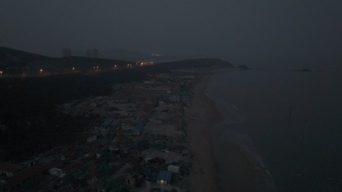 航拍威海高区后荆汪海岸养殖场黎明夜景