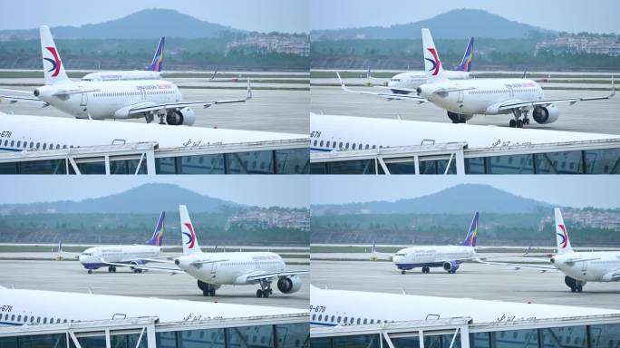 机场停机坪跑道上准备起飞移动的飞机