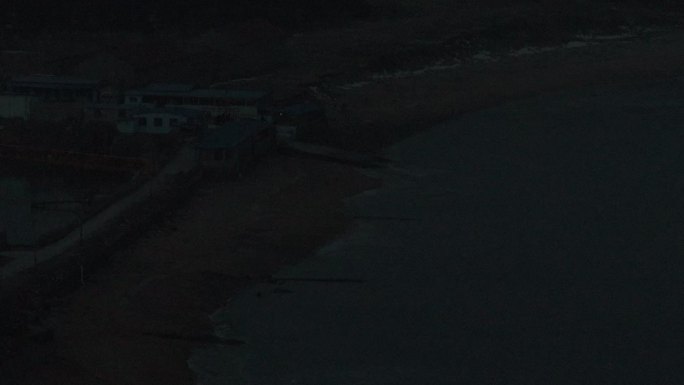 航拍威海高区后荆汪海岸养殖场黎明夜景