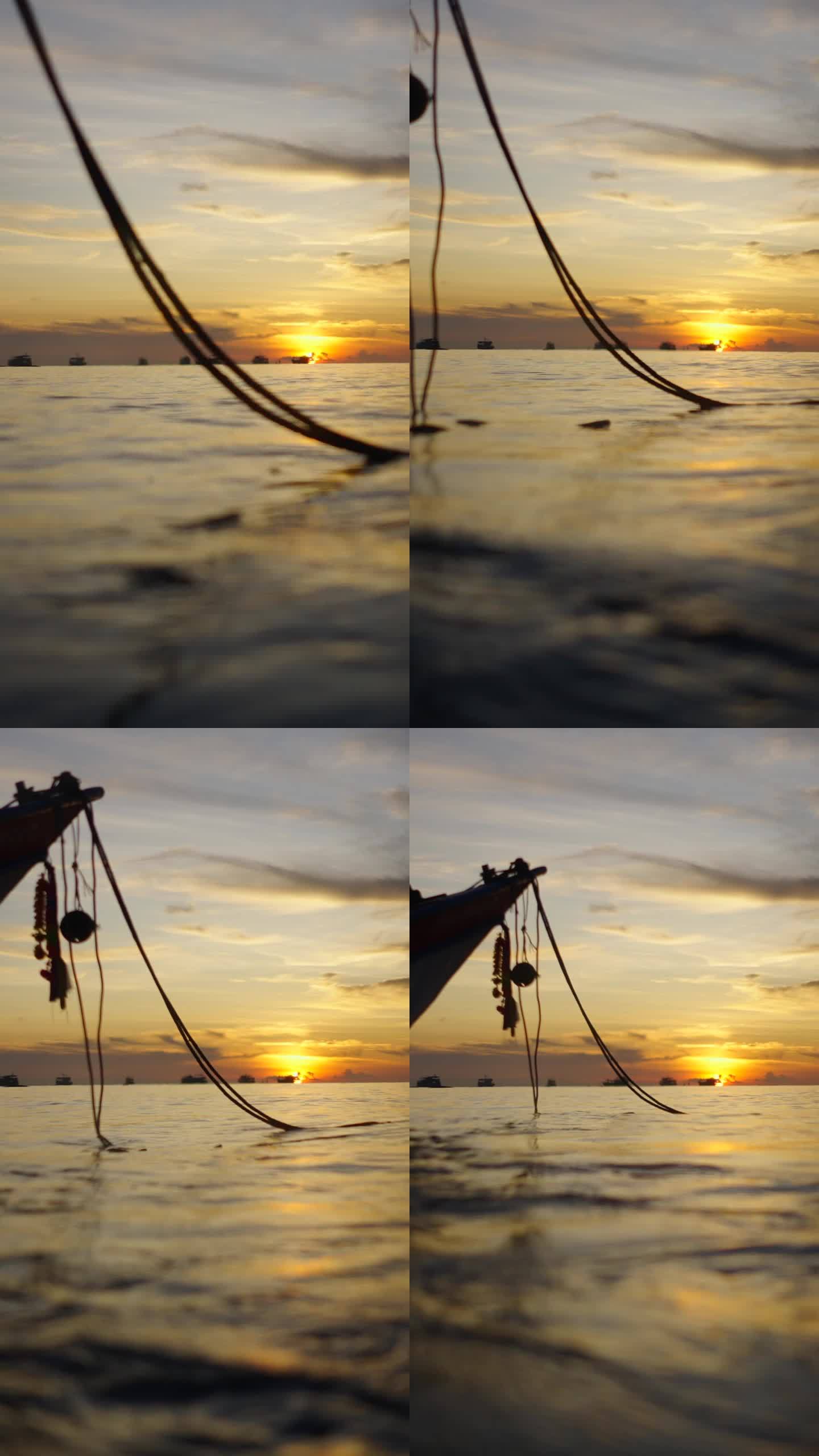 在泰国，一艘船的锚绳在海水中摇摆