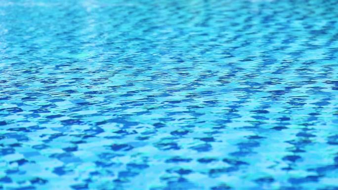 游泳池满画幅蓝色透明水波纹反射背景
