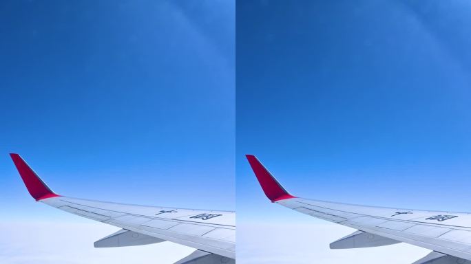 飞机在高空云层上飞行巡航俯瞰地面