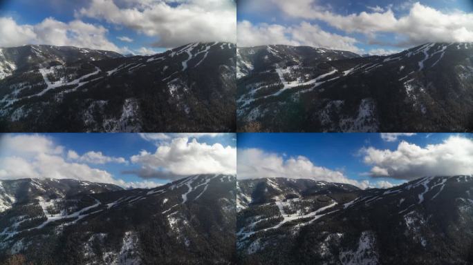白杨高地延时阿贾克斯滑雪道运行酪乳雪堆栗色钟金字塔峰落基山脉冬季蓝天多雪多云雾运动风景优美的景观