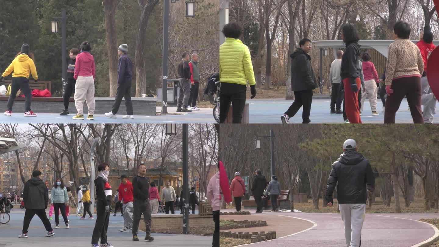 冬天街头公园户外全民健身踢毽子遛弯跑步