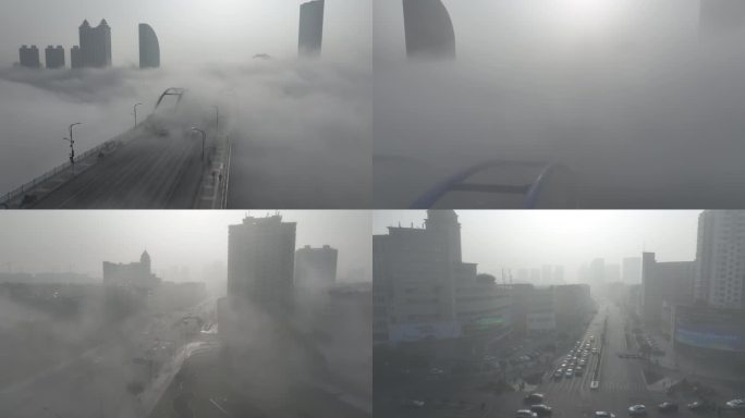 航拍大雾笼罩下的富春江二桥