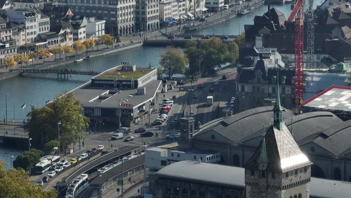 阳光明媚的一天飞越苏黎世市中心的交通街道大桥航拍全景4k瑞士