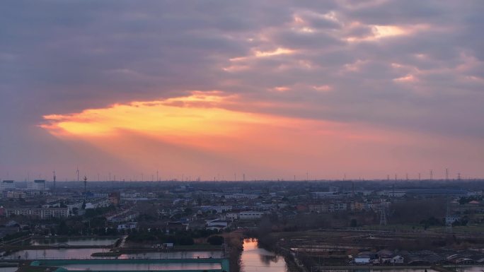 航拍乡村振兴龙型丁达尔光效河流鸟群夕阳