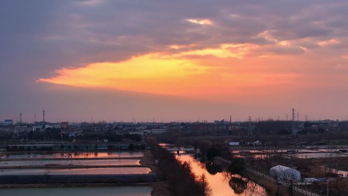 航拍乡村振兴龙型丁达尔光效河流鸟群夕阳