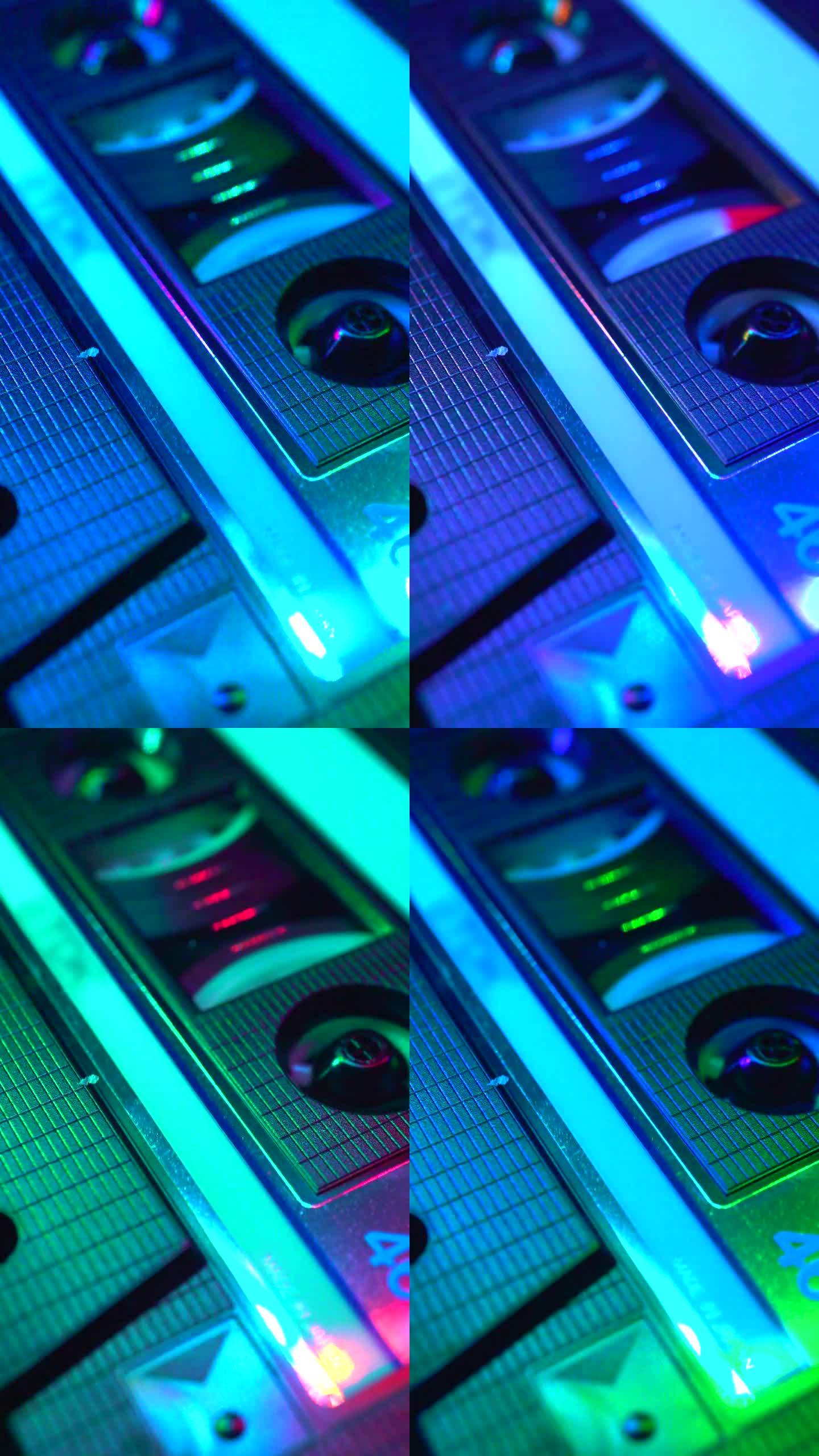 俱乐部里五颜六色的灯光照亮了正在播放的盒式磁带