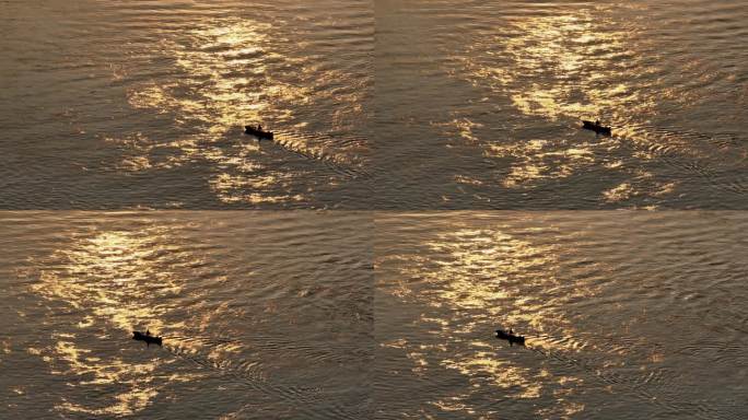 唯美夕阳下湖面行驶小船4K实拍