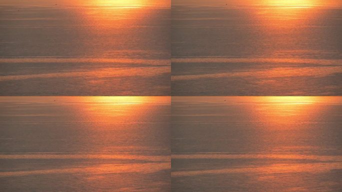 水面的海景与傍晚的金色日落，自然的背景