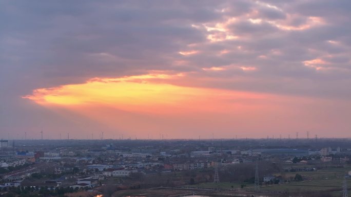 航拍乡村振兴龙型丁达尔光效河流鸟群夕阳