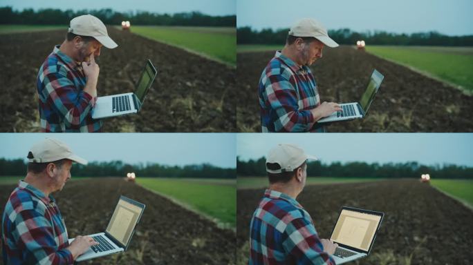 SLO MO男性农民在黄昏时分在有机农场行走时使用笔记本电脑。农产品检验。