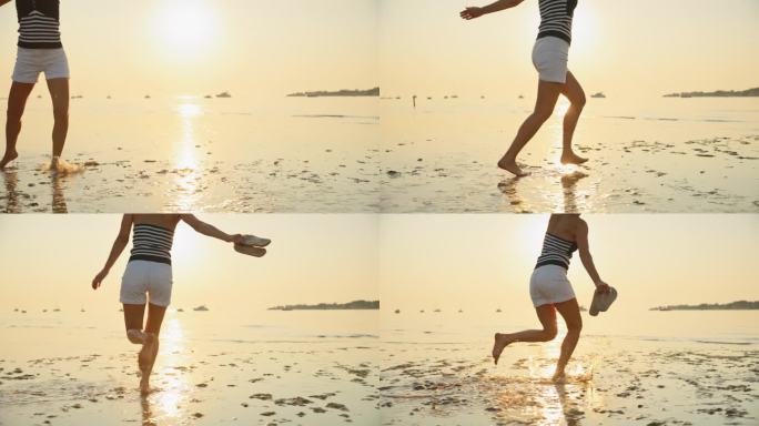 女子在沙滩上跑步，享受度假期间的日落