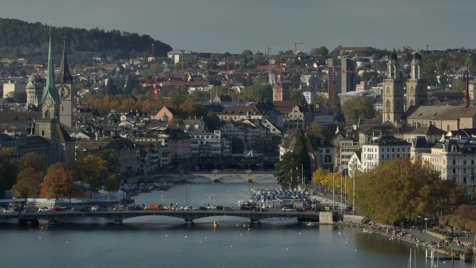 阳光明媚的一天苏黎世市著名的湖边游艇码头中心区航拍全景4k瑞士