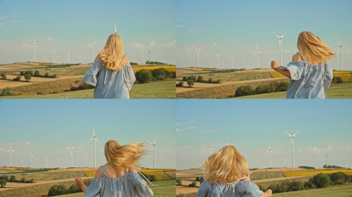 SLO MO追逐明天:女人快乐地奔向风力涡轮机