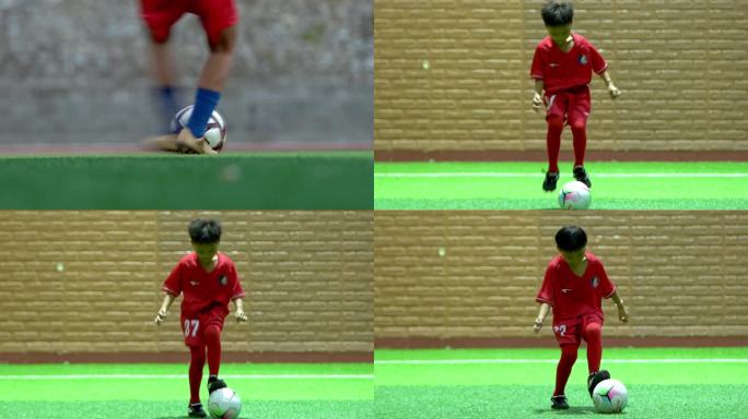 儿童踢练习足球