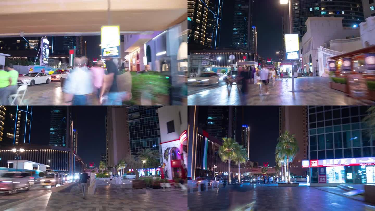 夜晚照亮迪拜码头著名的拥挤的海湾交通街道步行全景4k延时阿联酋